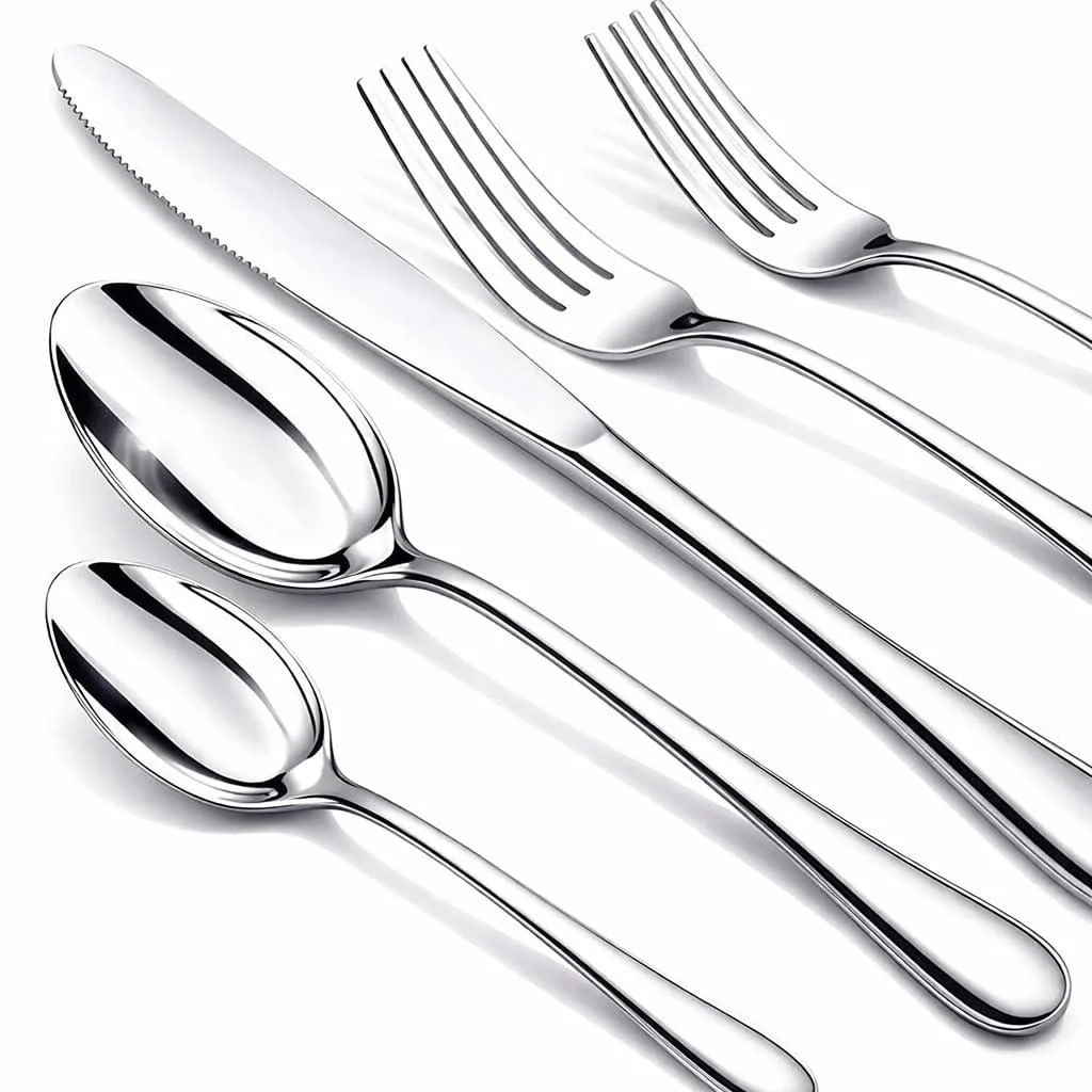 A 60-piece stainless steel cutlery set with mirror-polished silver finish laid out in rows