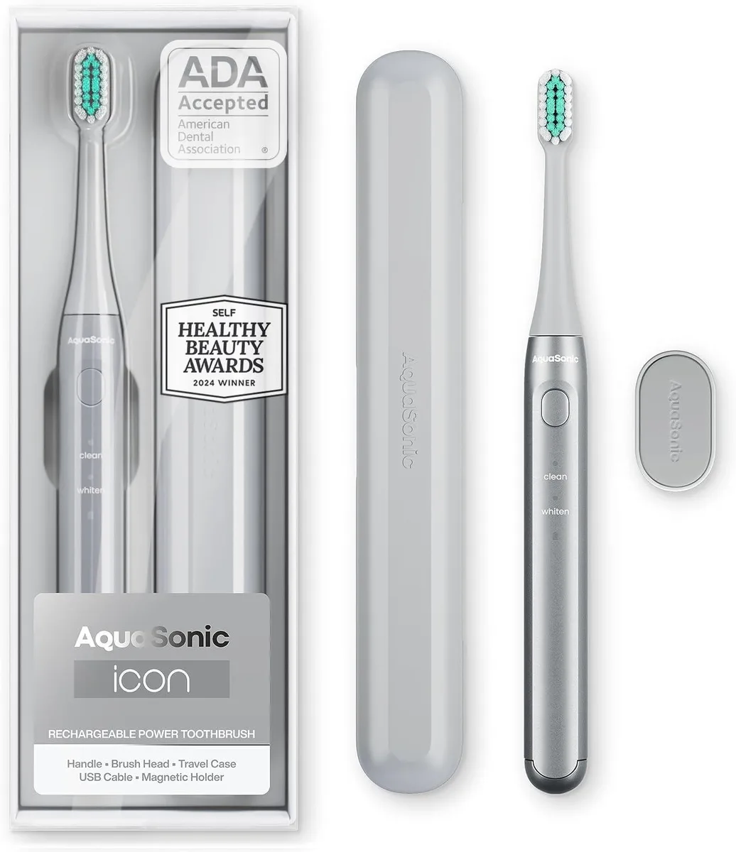 White rechargeable toothbrush with magnetic holder and slim travel case