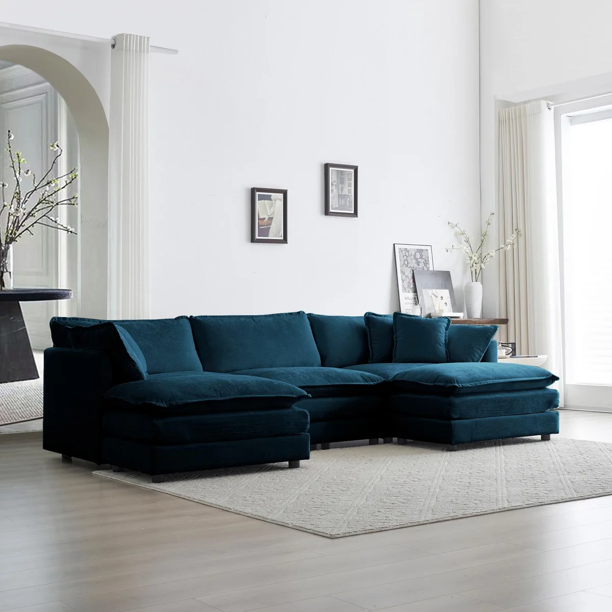 Blue chenille U-shaped sectional sofa with two ottomans and five pillows