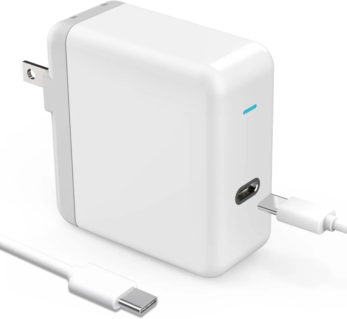 White rectangular wall charger with folding prongs and a long black USB-C cable coiled beside it