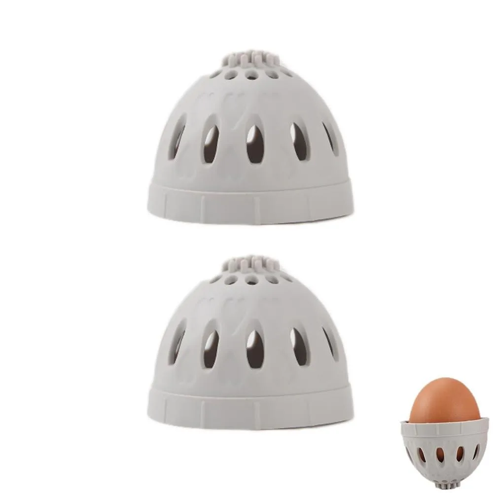 Two grey plastic egg brushes with rotating silicone bristles