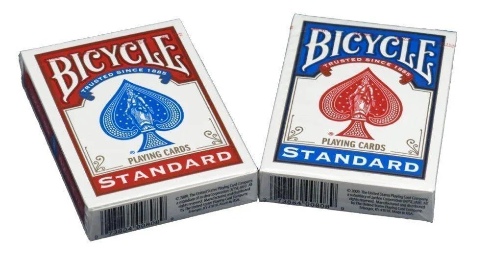 Six sealed Bicycle poker decks in red and blue boxes