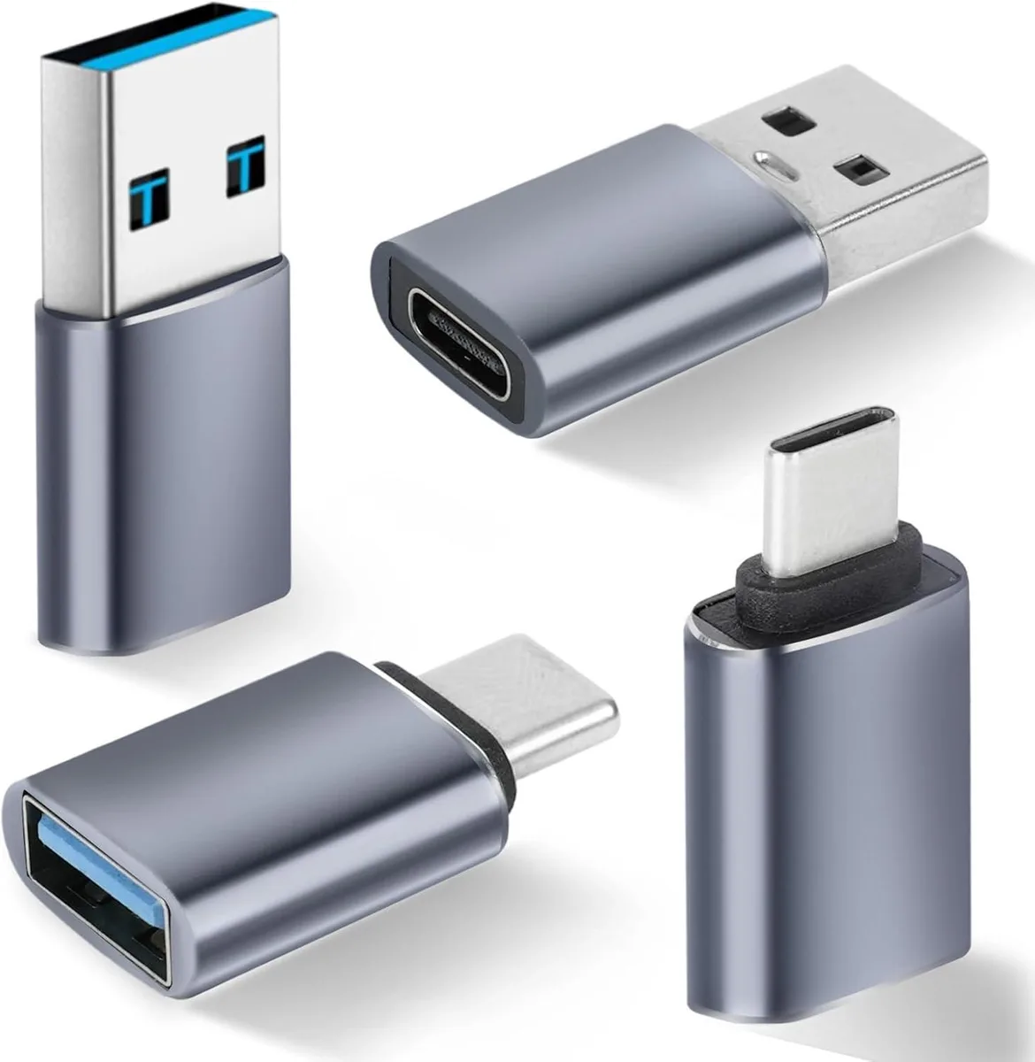 Four small metal adapters, two USB-A to USB-C and two USB-C to USB-A