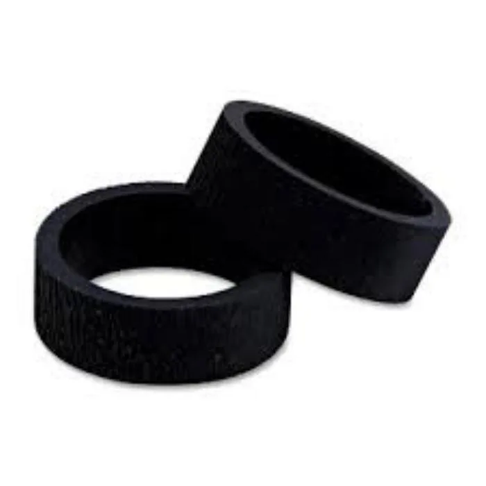 Two grey rubber rollers with textured surfaces on a white background