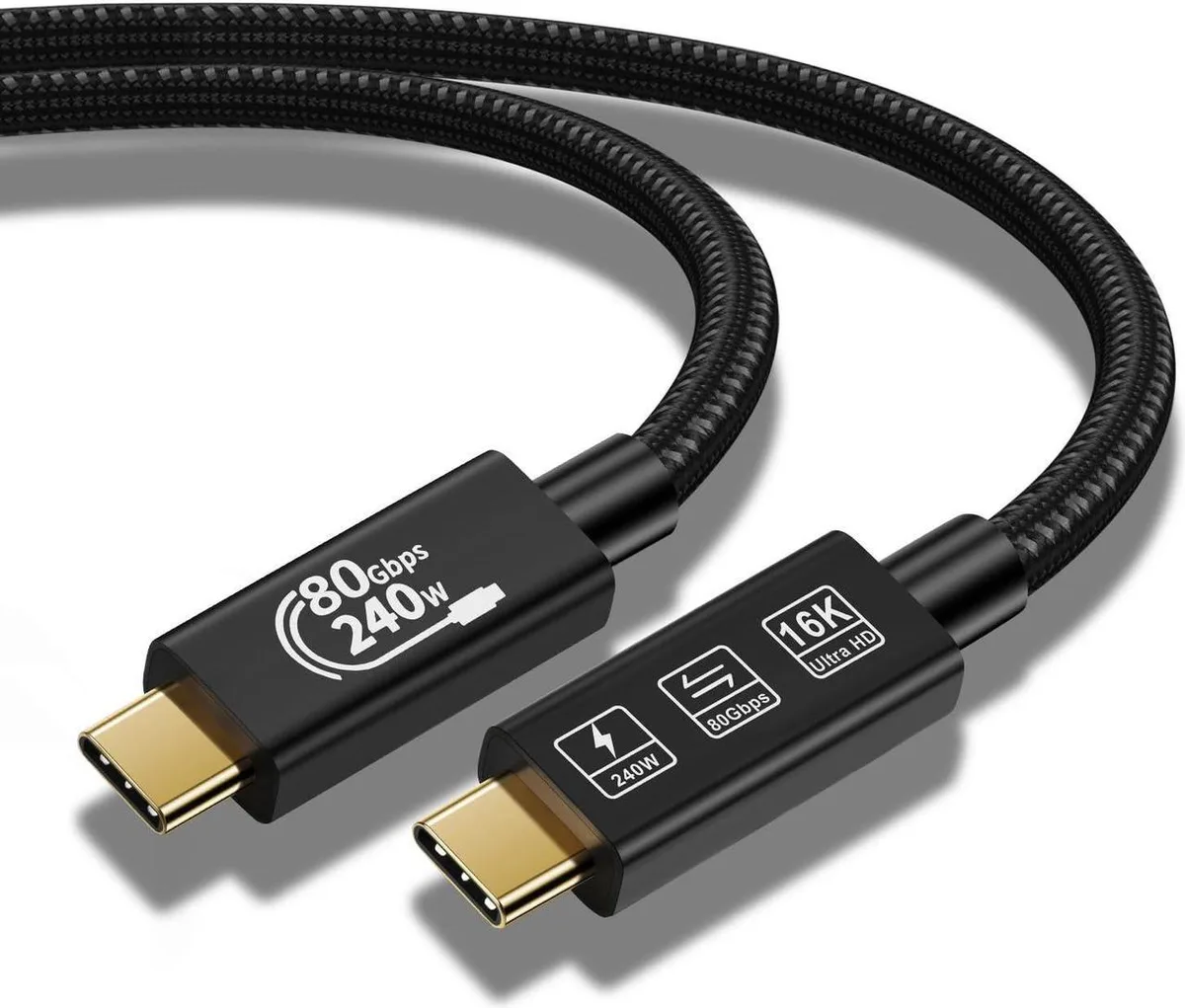 Black USB-C to USB-C cable coiled showing connectors and braided sleeve