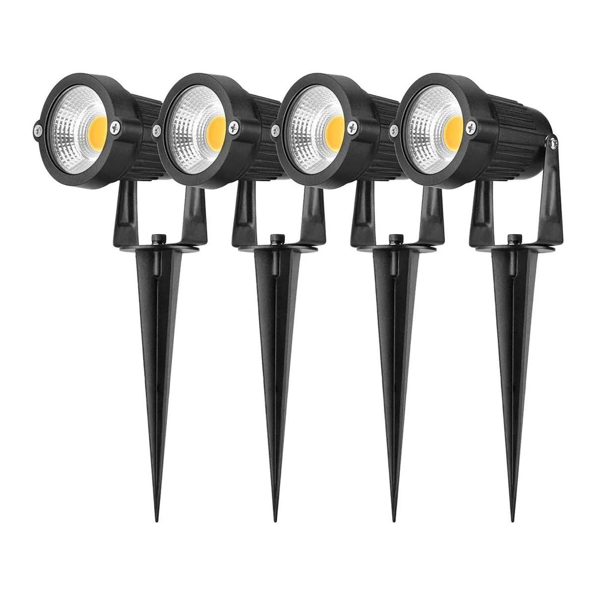 Four compact spotlights with dark finish and stake mounts