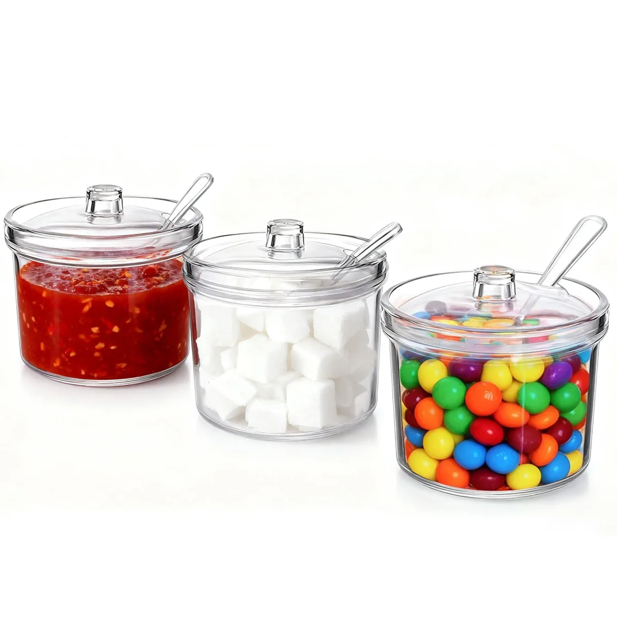 Three clear acrylic spice jars with lids and spoons, 10.5cm diameter by 8.5cm high
