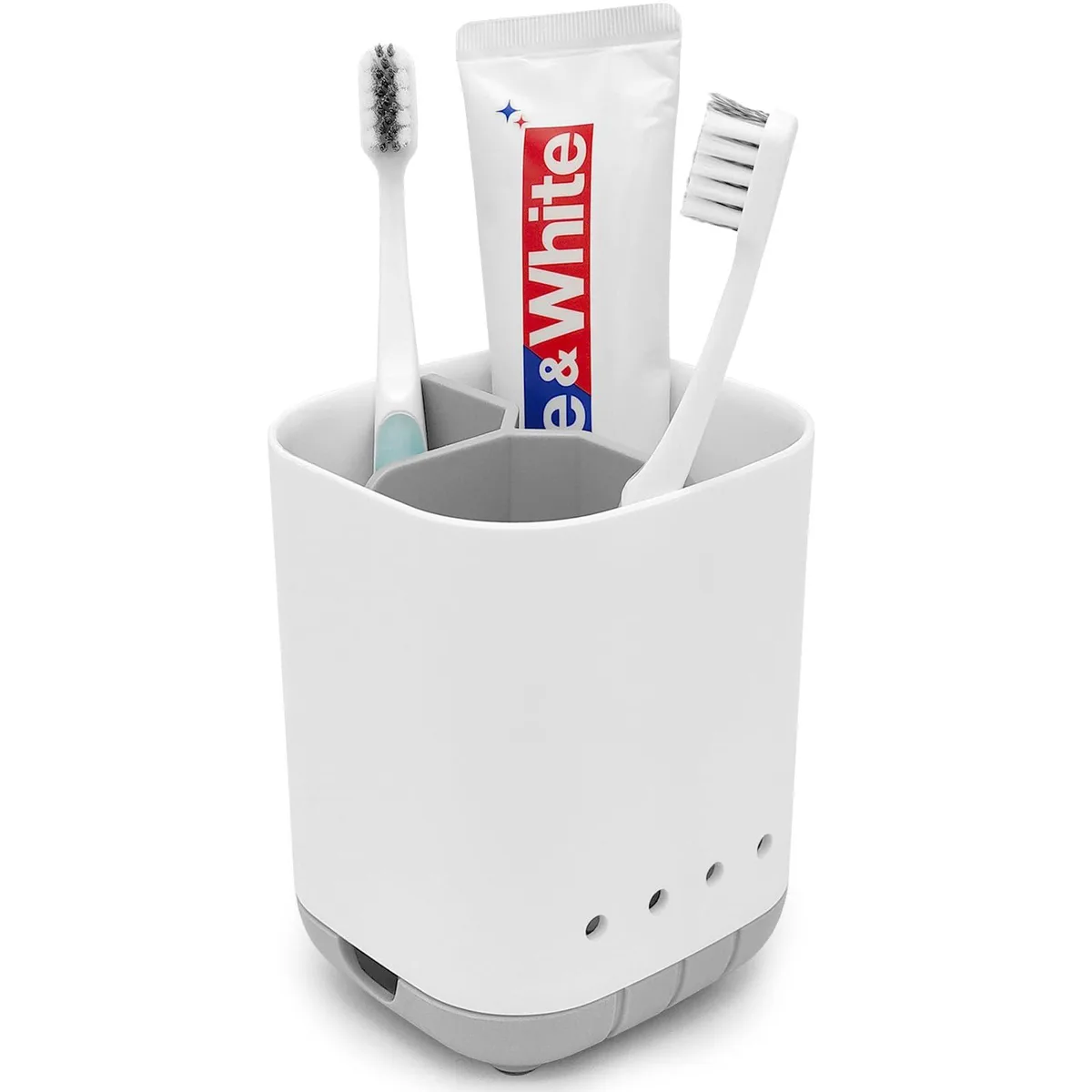 Grey plastic bathroom toothbrush holder with three compartments, detachable parts, drainage holes, and non-slip base