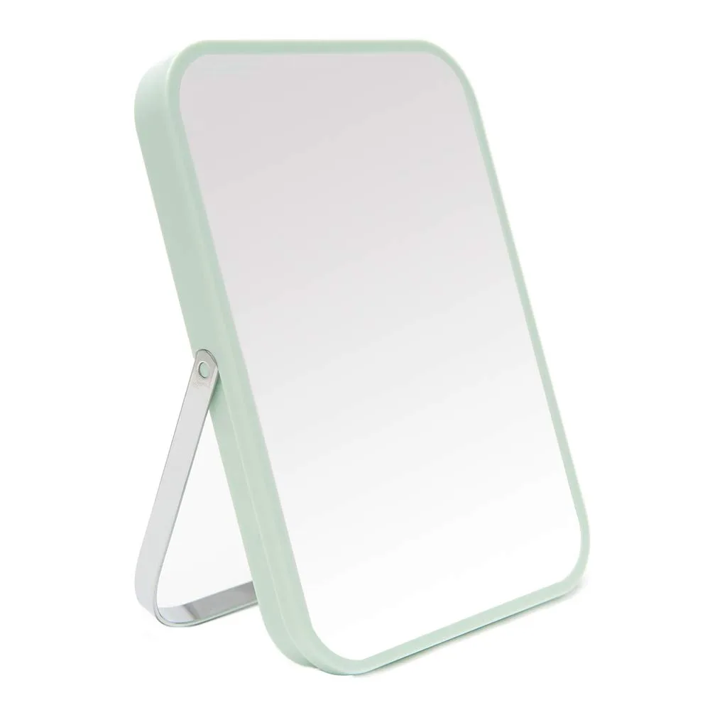 Square 8-inch folding mirror in macaron green with a stainless steel stand that adjusts 90°