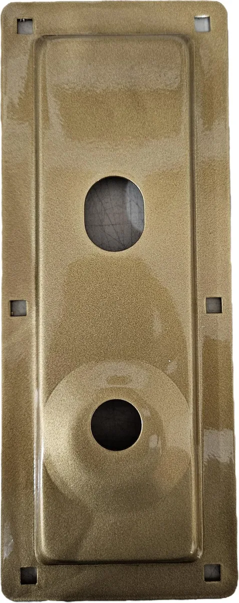 Rectangular gold metal plate with raised centre, four corner holes