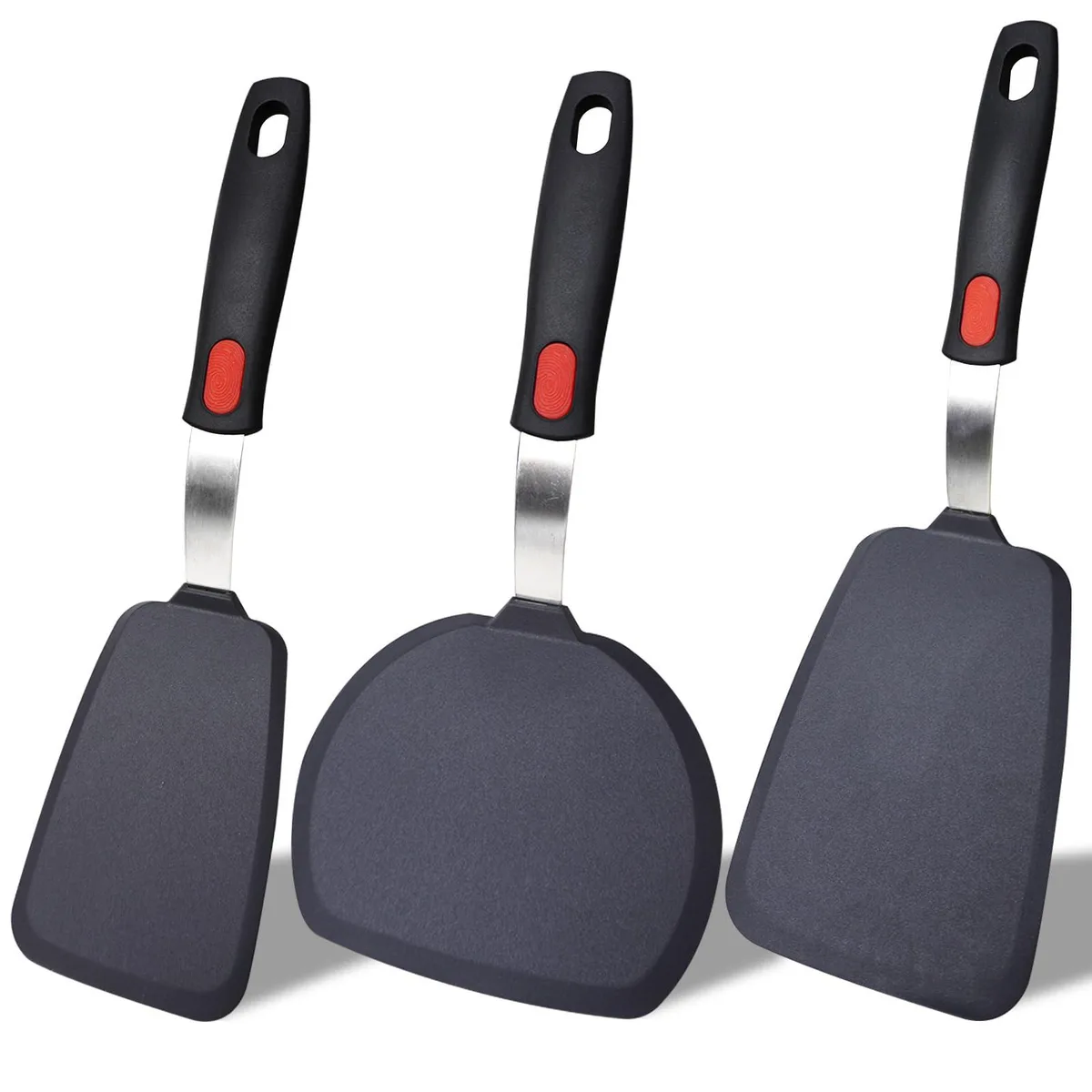 Three black silicone spatulas with red grips, different shapes