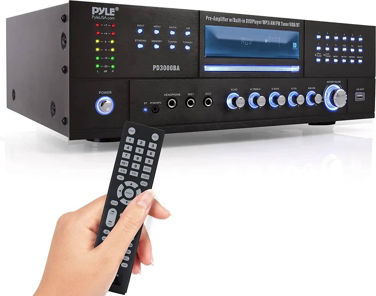 Silver rack-mount amplifier with front CD/DVD slot, LCD display, and knobs