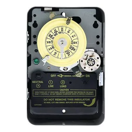 Gray metal box with a rotary dial and trippers