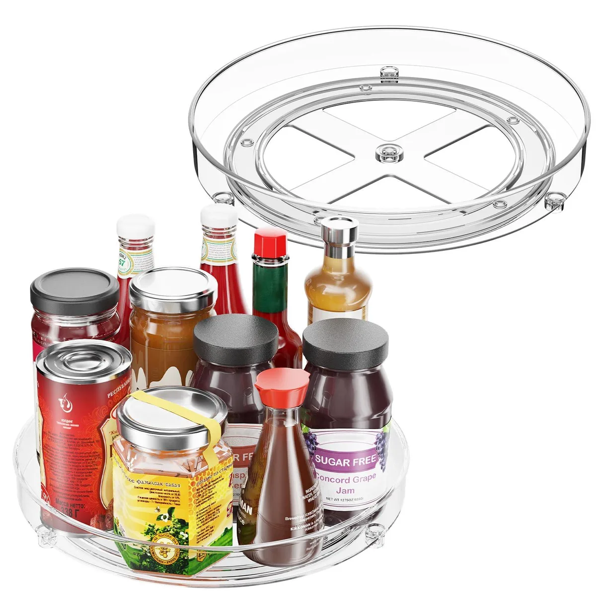 Four clear plastic 9.5 inch turntables with raised edges, stacked together