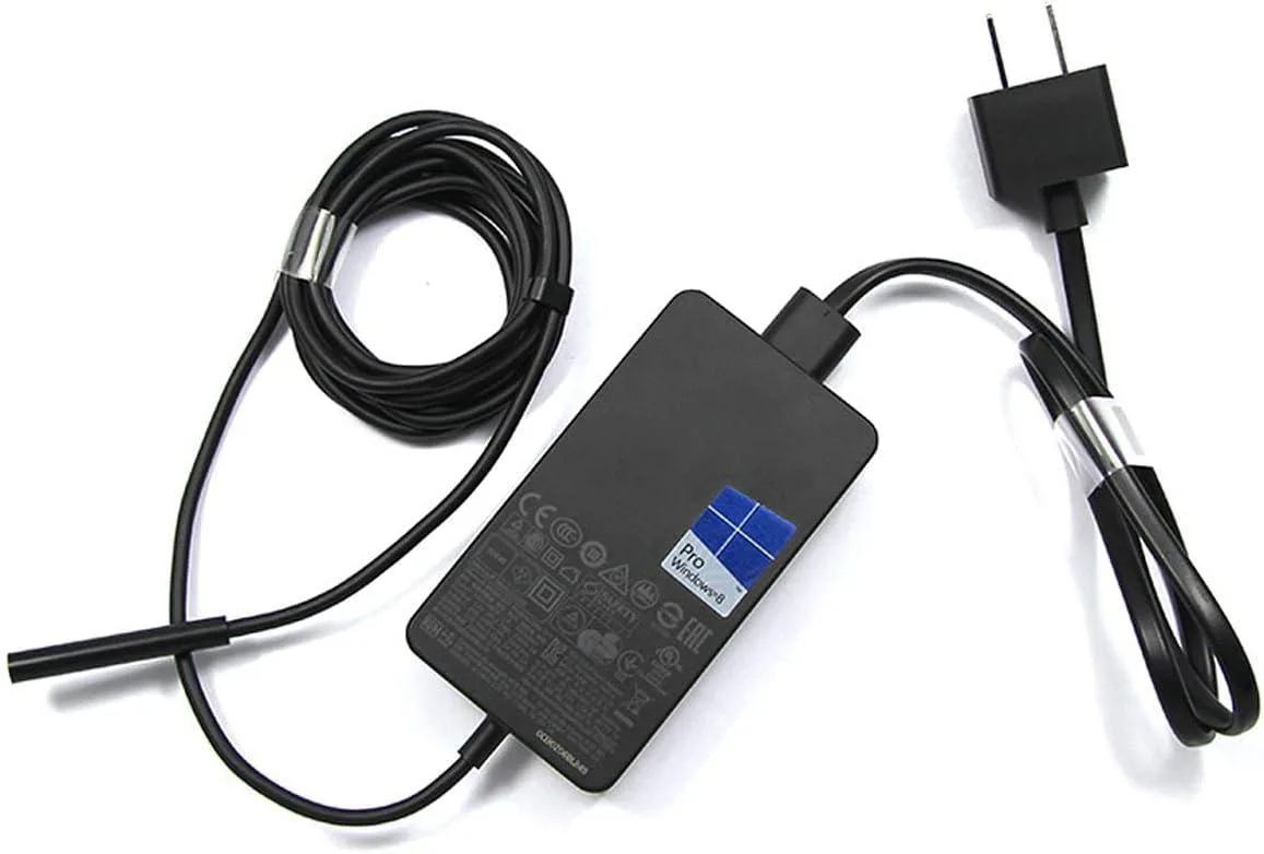 White rectangular 65W power brick with magnetic Surface connector and USB 2.0 port