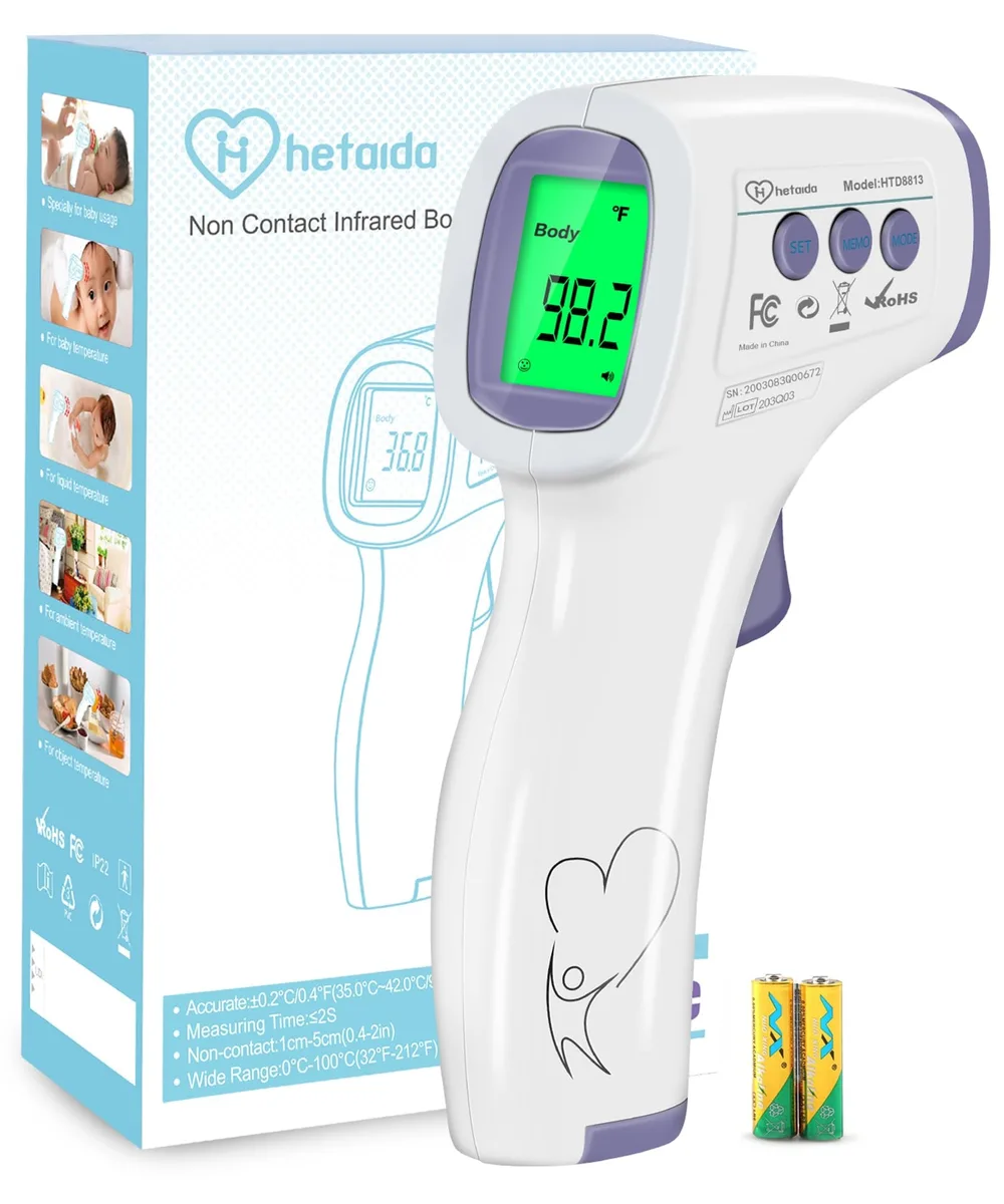 Purple infrared thermometer with LCD display and trigger button
