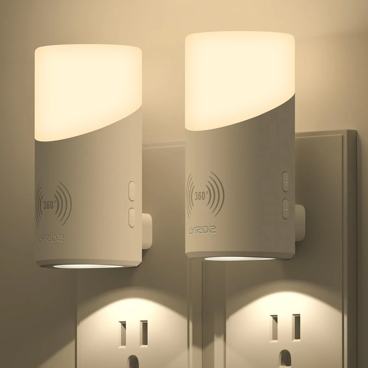 Two cylindrical matte metal and plastic night lights with 360° motion sensors