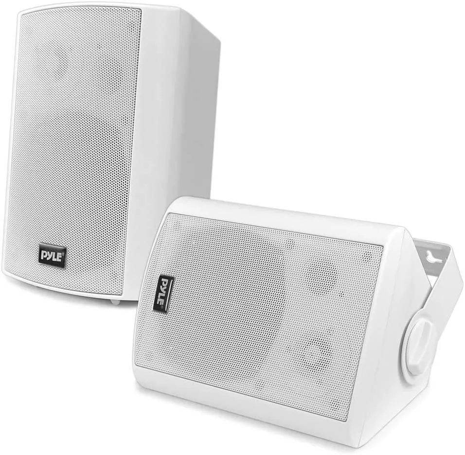 Pair of white rectangular wall speakers with black driver cones and silver tweeters