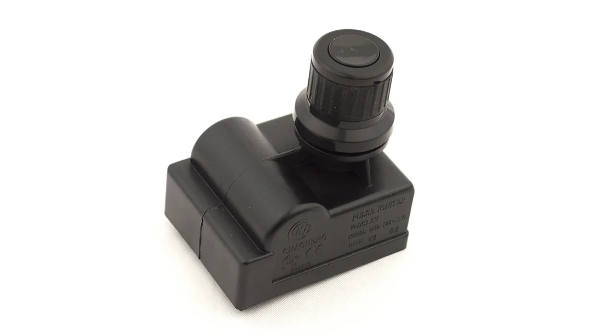 Small rectangular black plastic igniter module with two wire terminals
