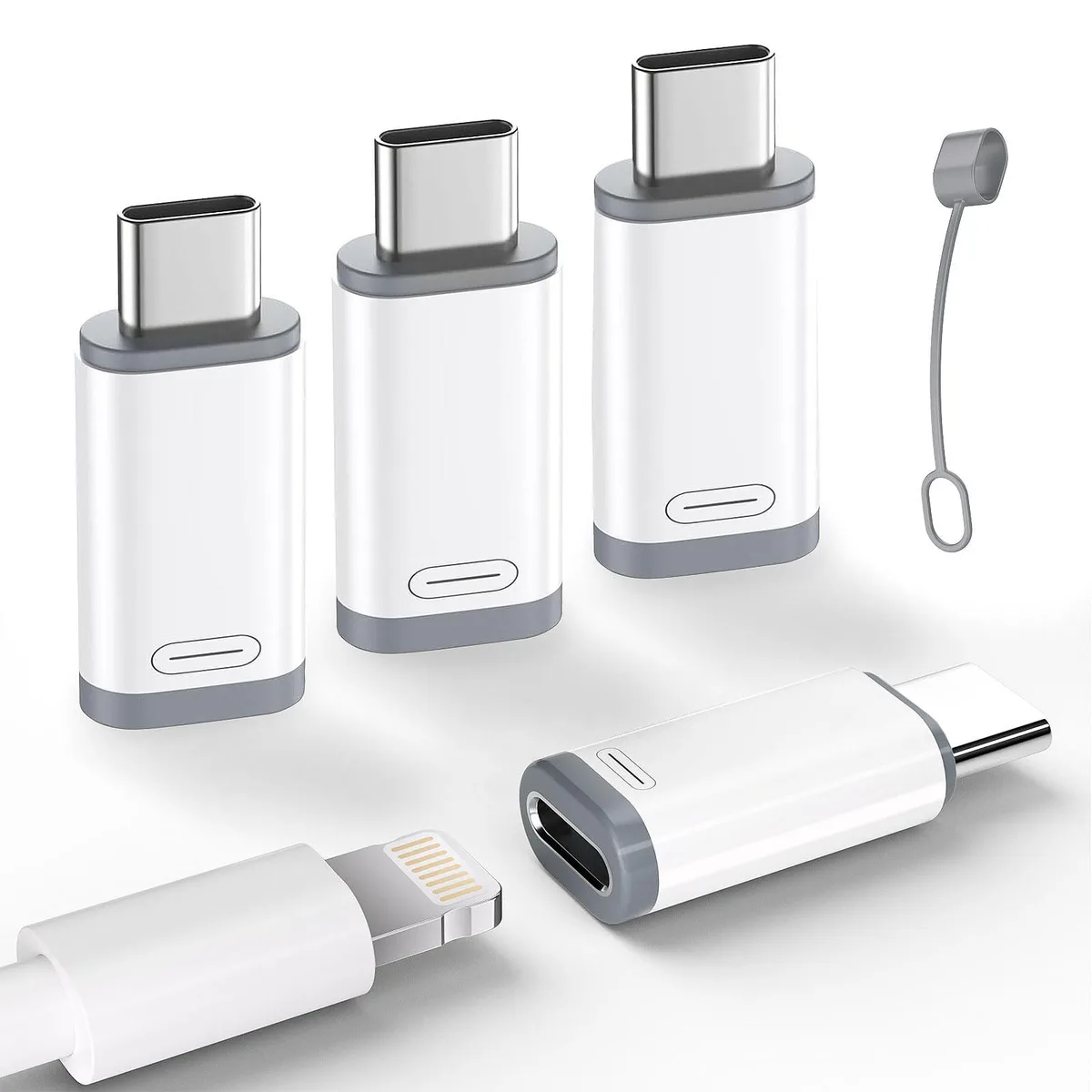Four small white Lightning female to USB-C male adapters