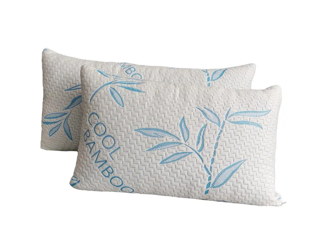Two white king-size bed pillows with zippered covers lying side by side