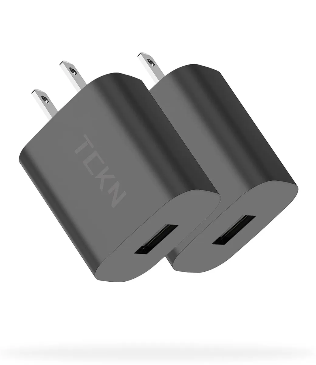 Two black USB wall chargers with foldable plugs shown side by side
