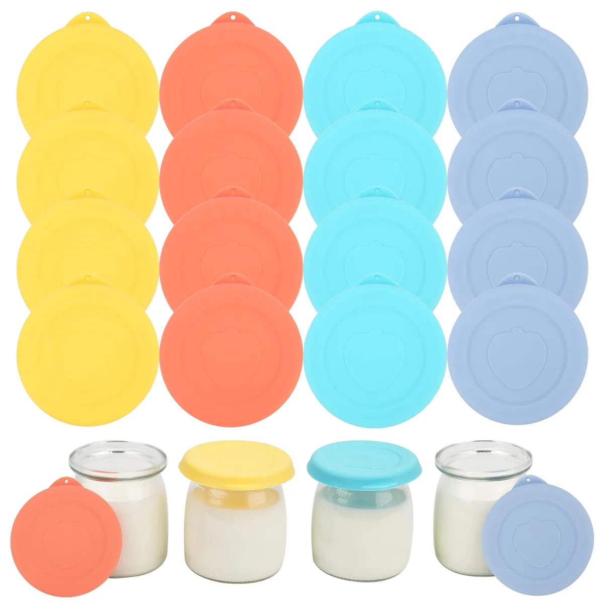 Sixteen flexible silicone jar lids laid flat, smooth matte finish, neutral colour