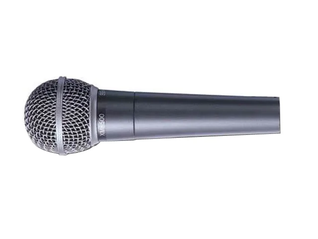 Silver cylindrical dynamic vocal mic with gold XLR connector, shock mount, pop filter, metal body, hard case included