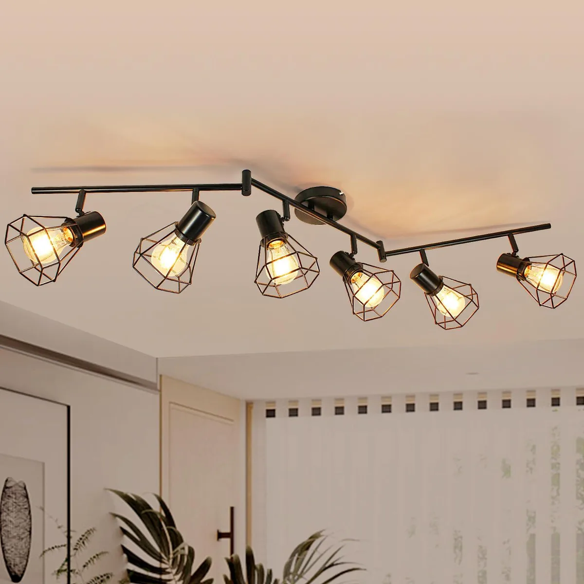 Black metal track with six adjustable cage shades, foldable arms, rotatable heads, semi-flush mount