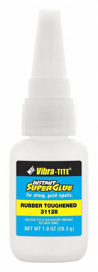 Clear adhesive in a one-ounce bottle with dropper tip