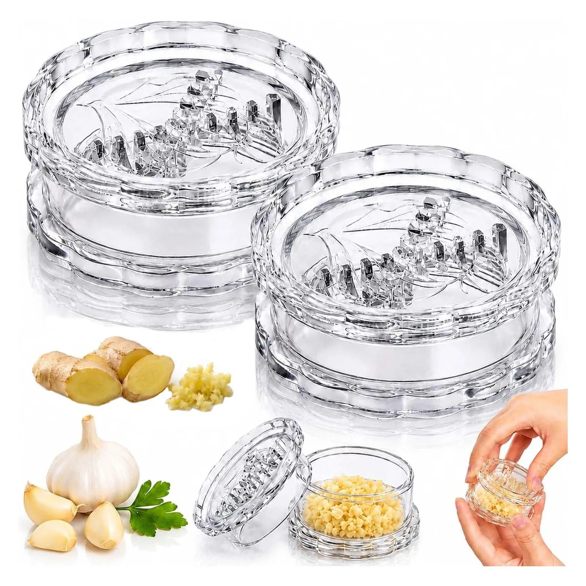 Two clear plastic garlic twisters, compact cylindrical shape, transparent finish