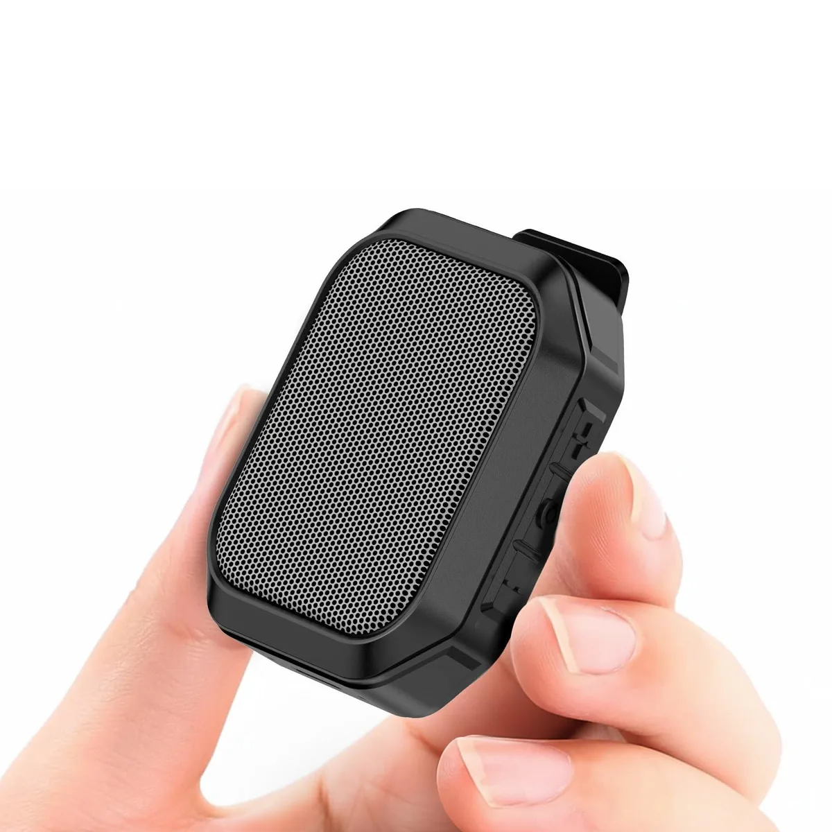Small grey rectangular wearable speaker with a sturdy clip on the back