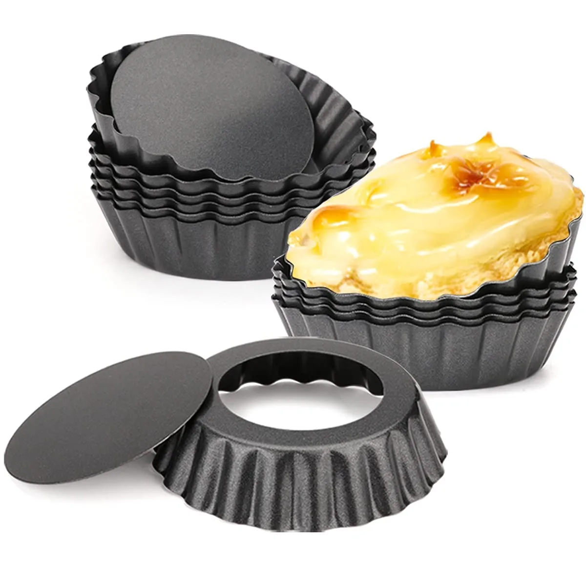 Twelve black fluted tart tins with removable bases