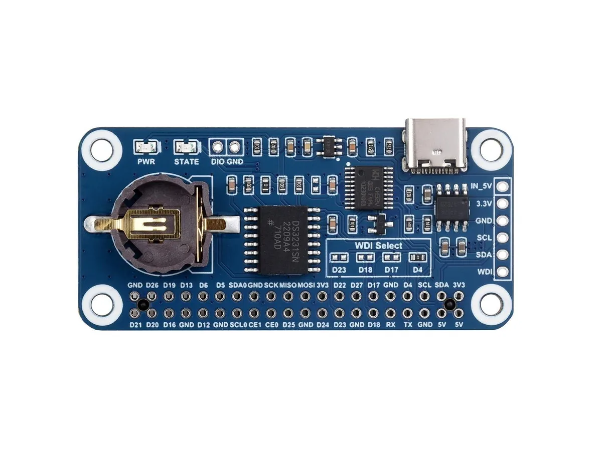 Green circuit board with 40-pin GPIO header and DS3231SN chip, coin-cell holder visible