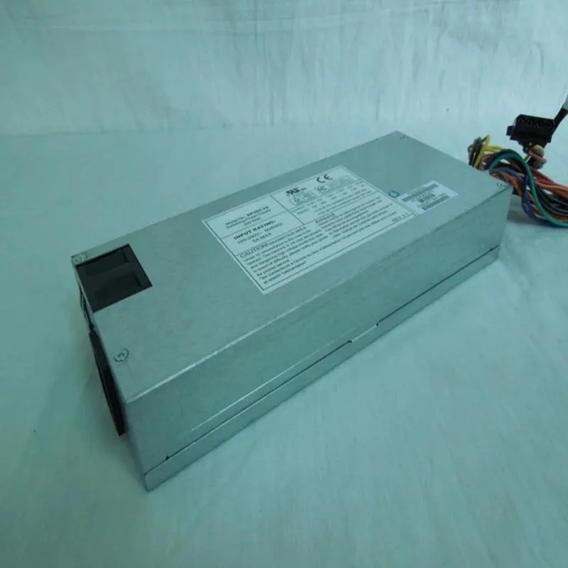 Silver 1U power supply with rear fan grille and cable bundle