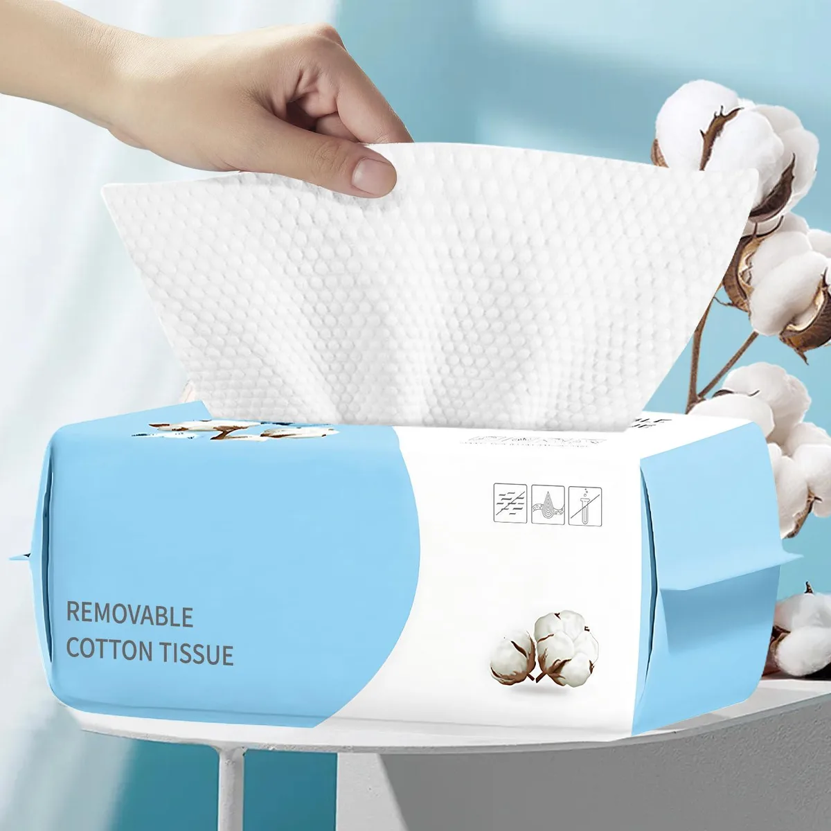 White cotton disposable face towels in a rectangular pack, 100 count, 7.9 inch square sheets
