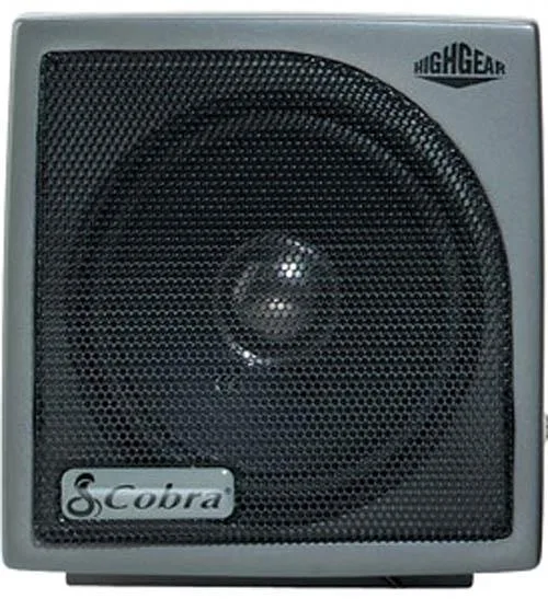 Black rectangular external speaker with front grille and Cobra branding