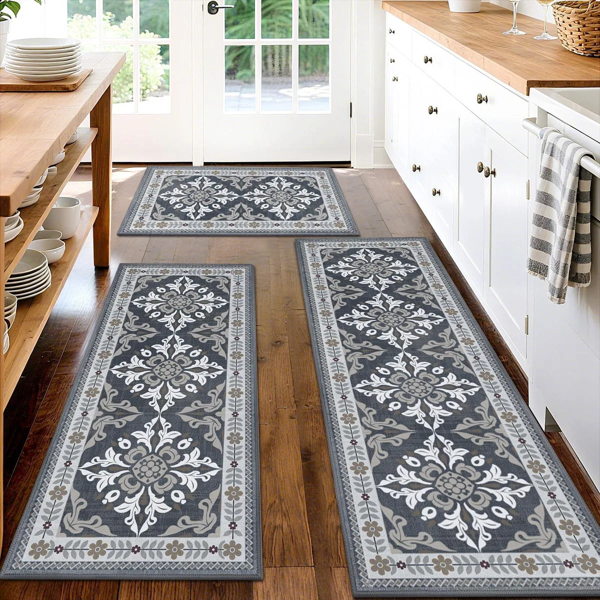 Three grey striped rectangular floor mats stacked together, machine-made polyester with anti-slip backing