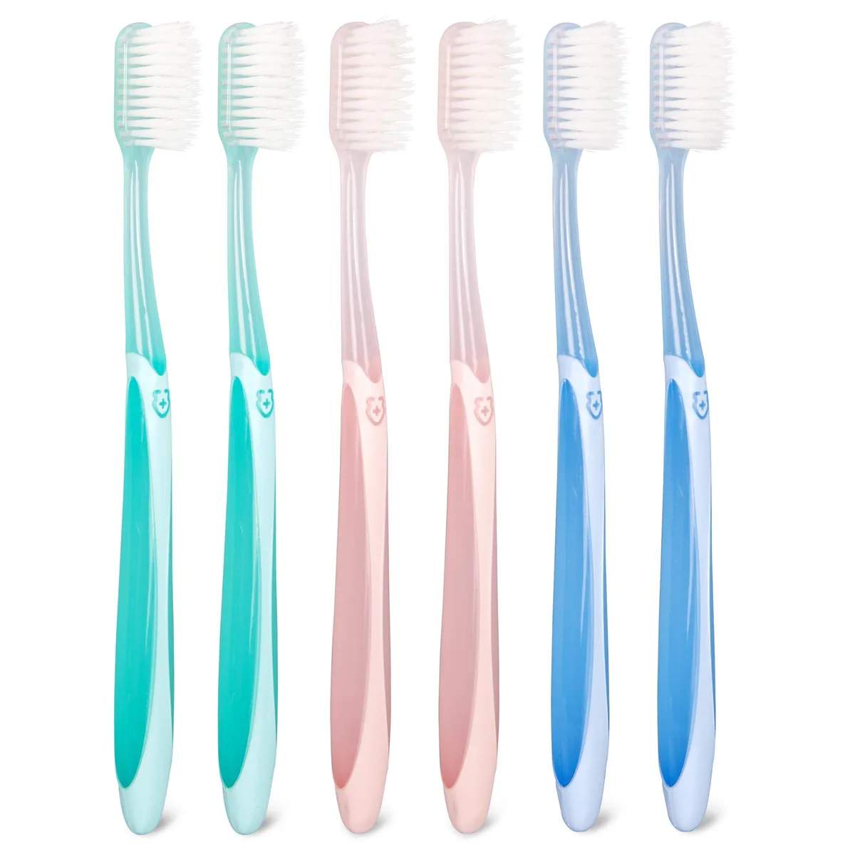 Six manual toothbrushes in three colors with travel caps