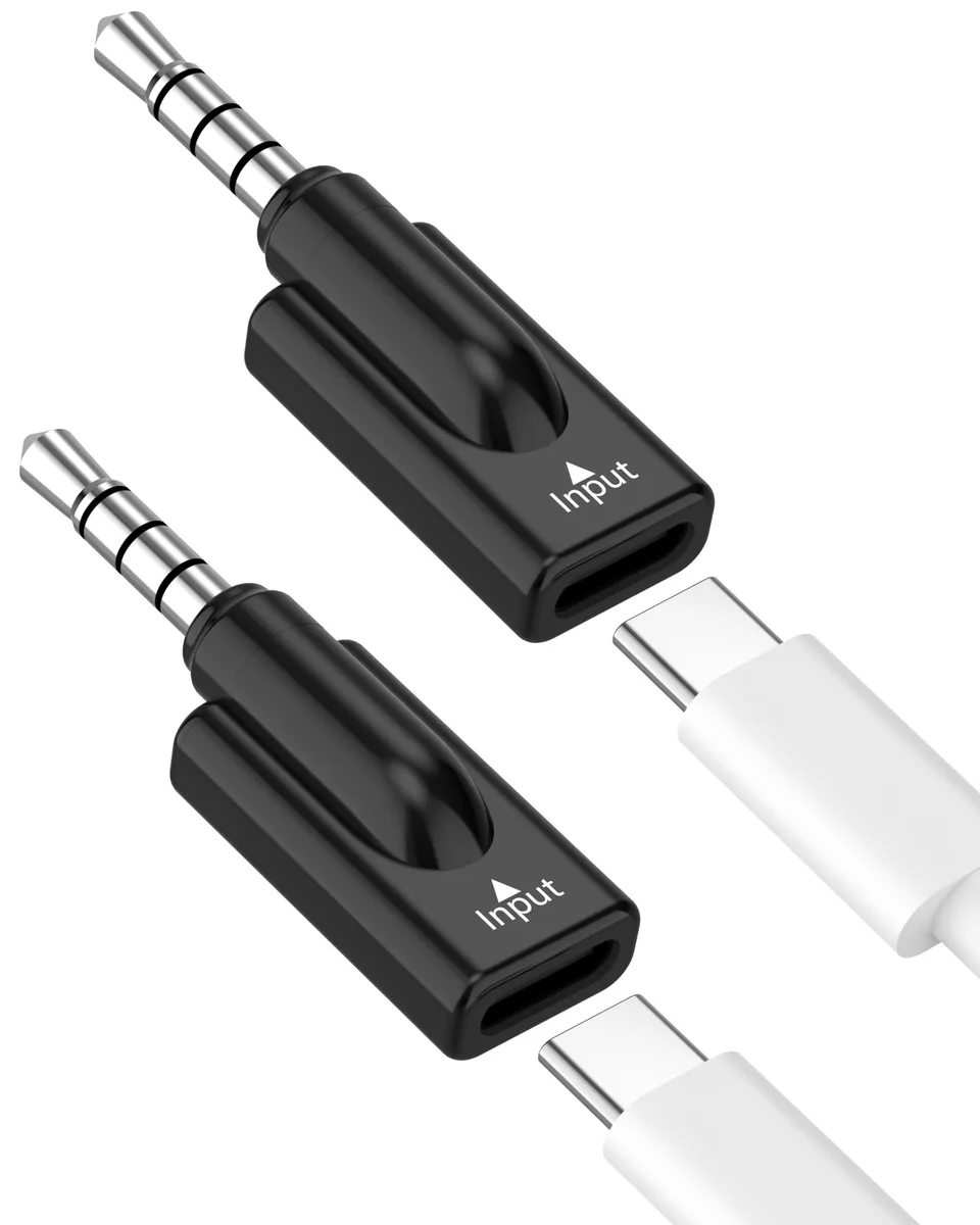 Two black USB-C to 3.5 mm audio adapters with short cables