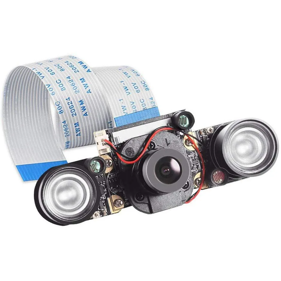 Small green circuit board with camera sensor and LED light module