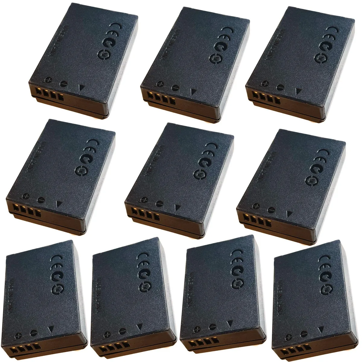 Ten black dummy-battery couplers with trailing cables in a row