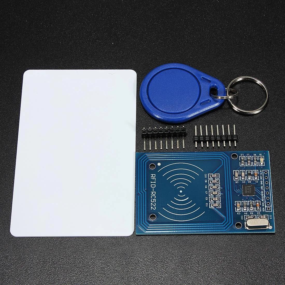 Black rectangular RFID reader module with gold pins