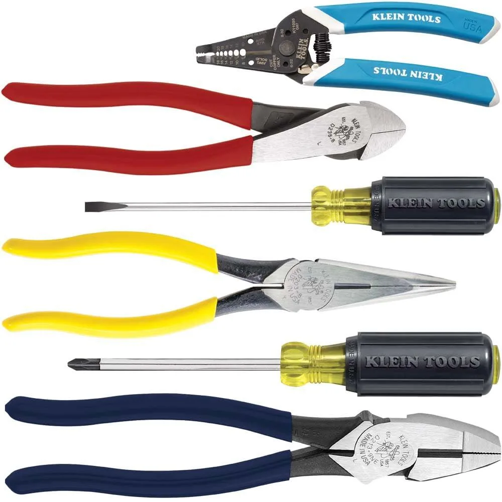 Blue plastic case holding six hand tools including pliers, screwdrivers and wire stripper