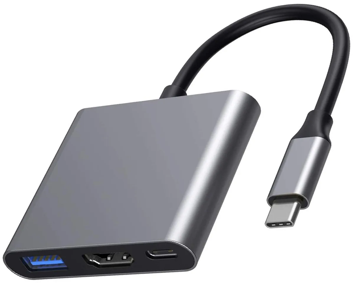 Grey rectangular USB-C multi-port adapter with HDMI, USB 3.0 and USB-C charging ports, matte aluminium finish
