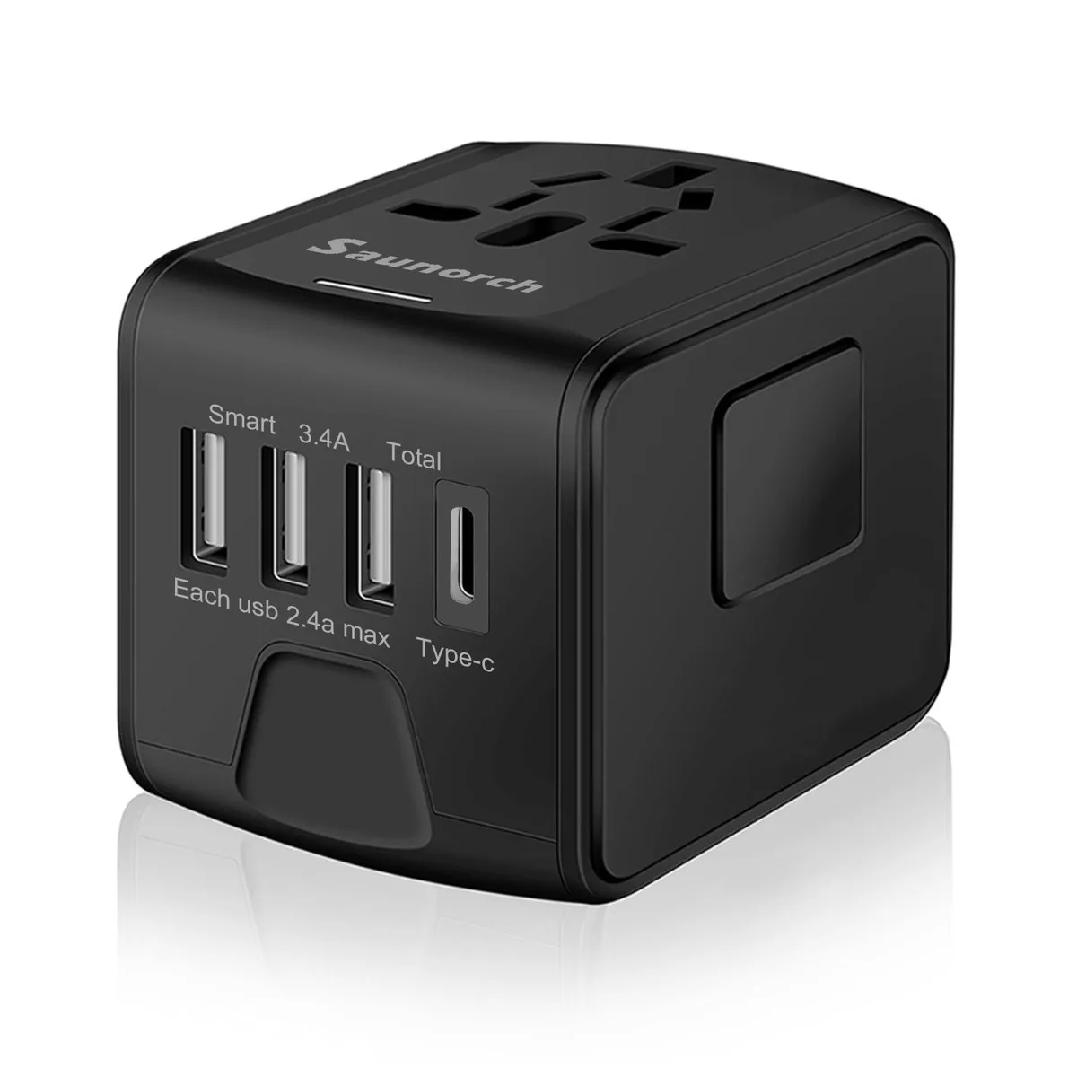 Black cube universal travel adapter with sliding plug pins, AC outlet and four USB ports
