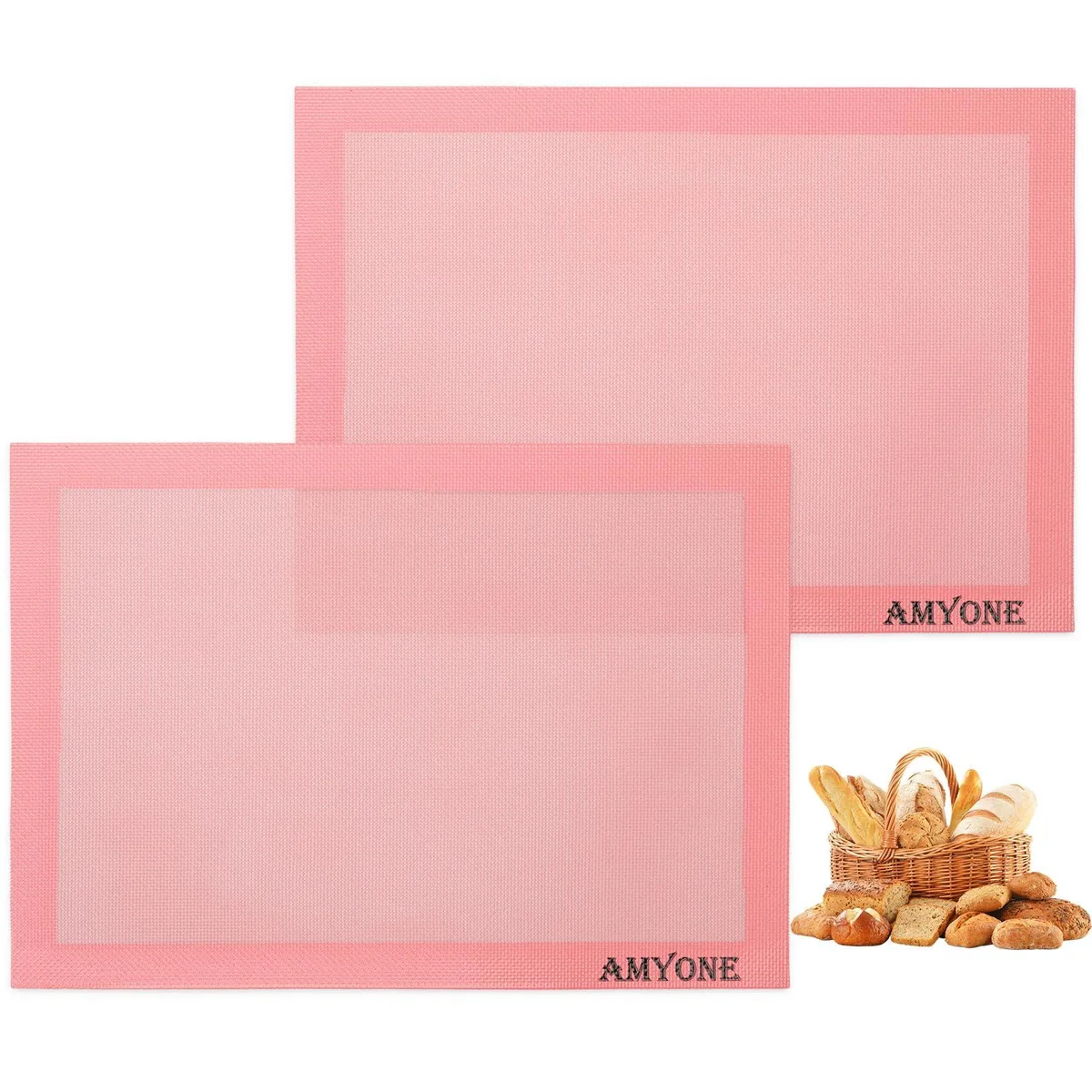 Two pink perforated silicone baking mats on a half sheet pan
