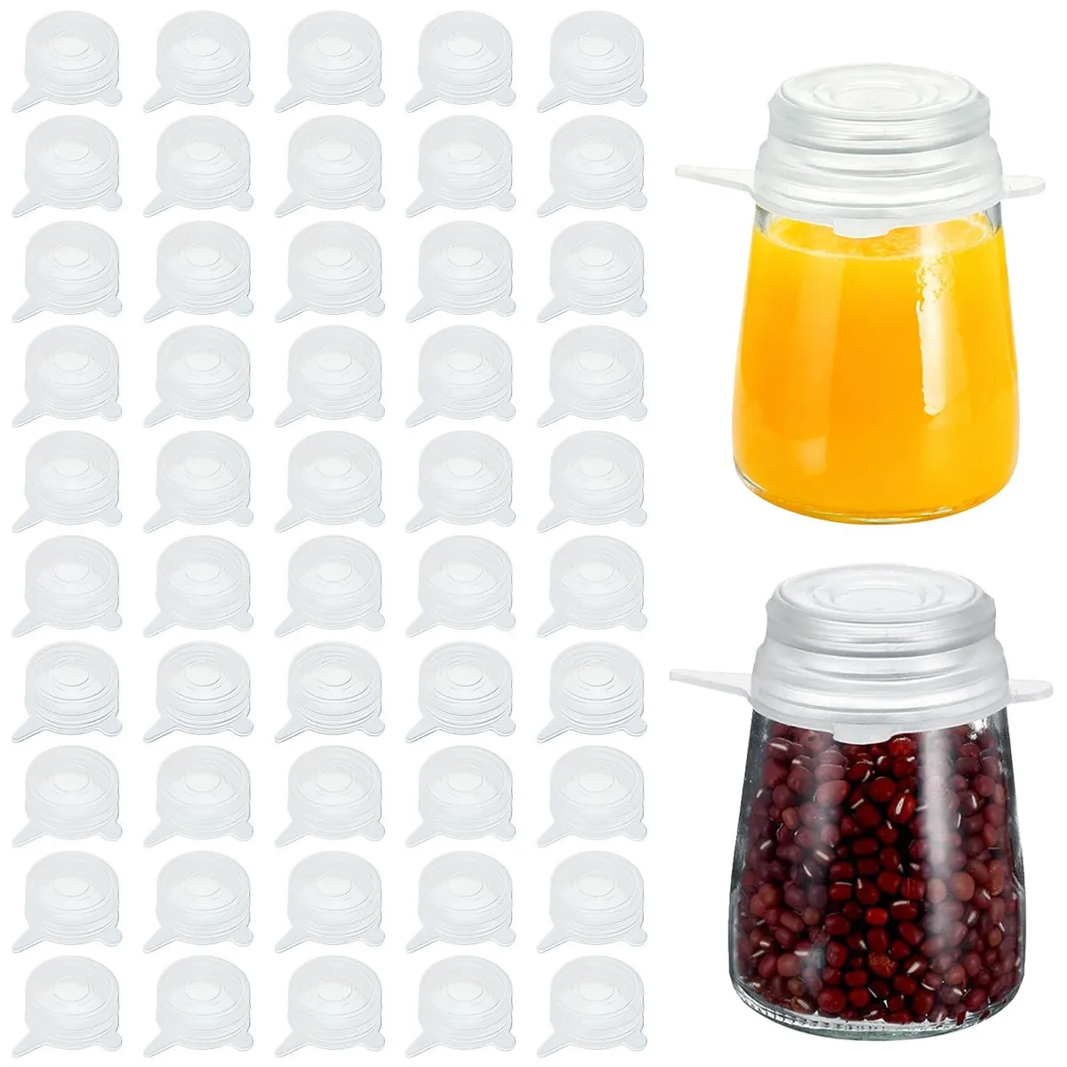 Fifty small white silicone stretch lids stacked together