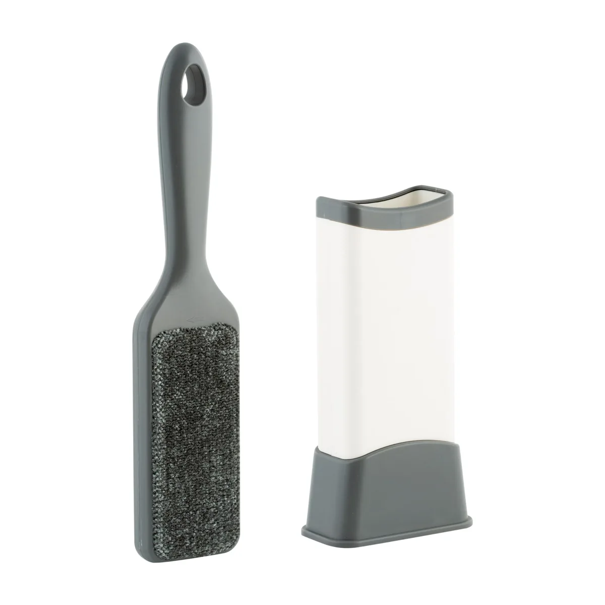 Grey double-sided lint brush with self-cleaning base, rectangular shape, compact size