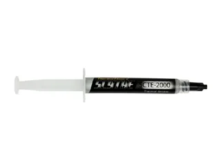Silver syringe with grey thermal paste inside